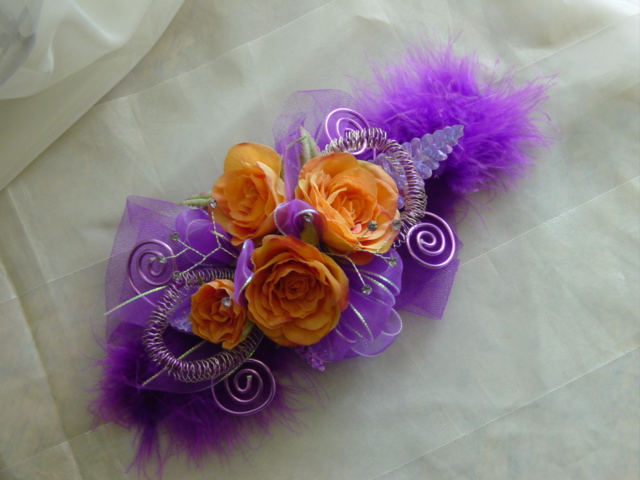 purple and orange prom corsage from Enchanted Florist Pasadena tx